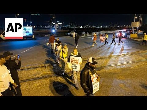 Dockworkers at US ports go on strike over wages and automation