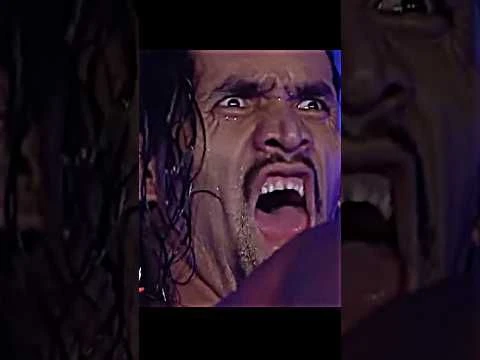 The great Khali trying to attack on Undertaker but Khali afraid