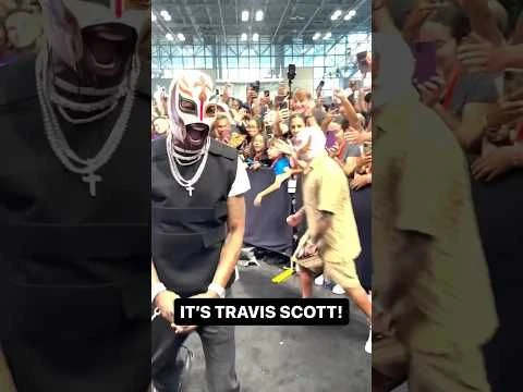 Rey Mysterio introduces his new tag team partner TRAVIS SCOTT at Fanatics Fest