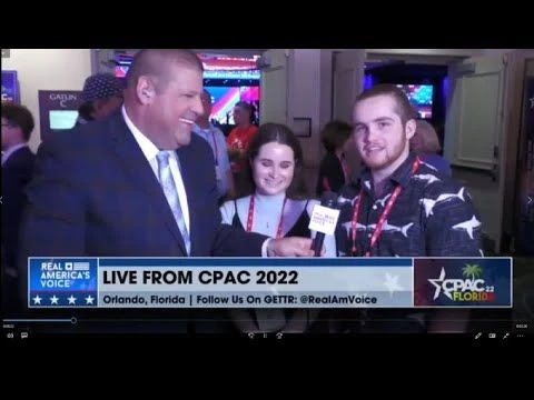 Josh and Julia Zwicker of Canada @CPAC2022 w/ David Zere of Real Americas Voice News