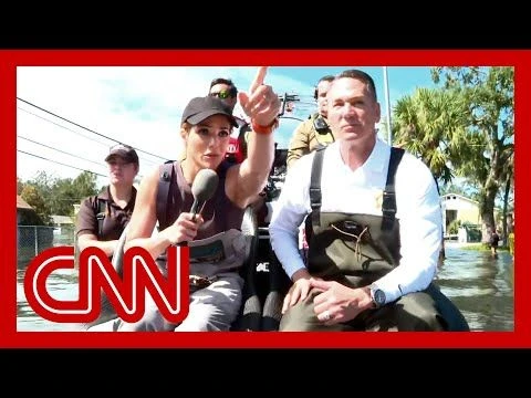 CNN tours flooded neighborhood on an airboat rescuing survivors