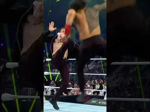 Roman Reigns gets nailed with a Helluva Kick